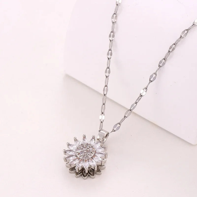 Kinetic Spinning Flower Necklace – Zircon Pendant
